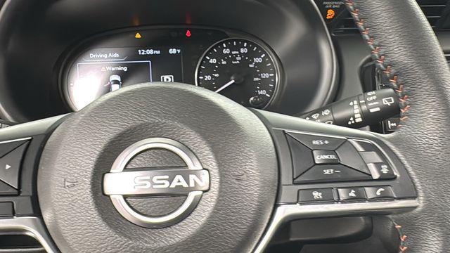Photo of 2024 Scarlet Ember Tintcoat/Super Black Nissan Kicks