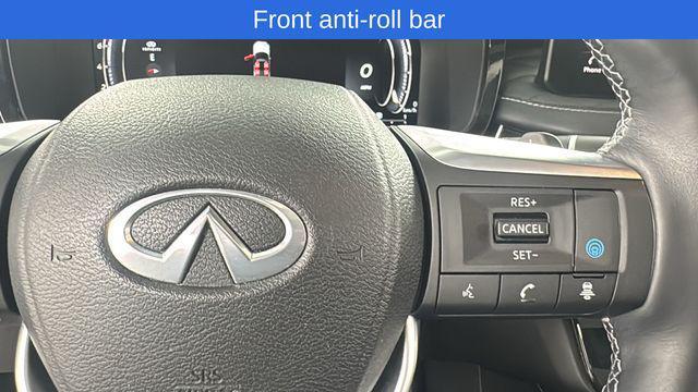 Photo of 2023 Moonbow Blue/Black Obsidian INFINITI QX60