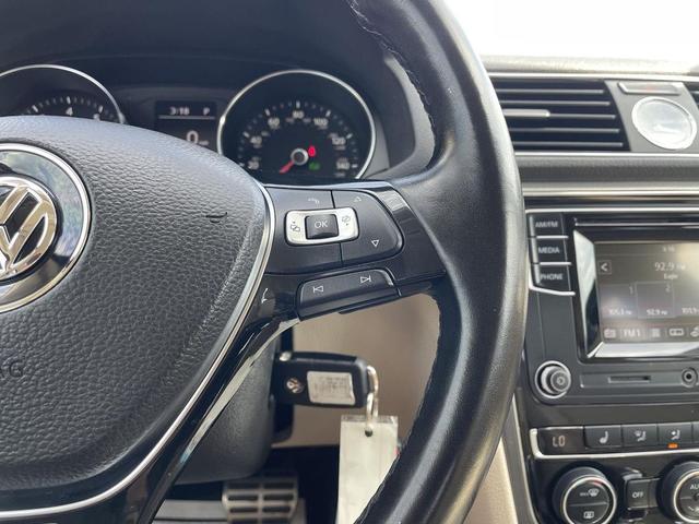 Photo of 2016 Fortana Red Volkswagen Passat