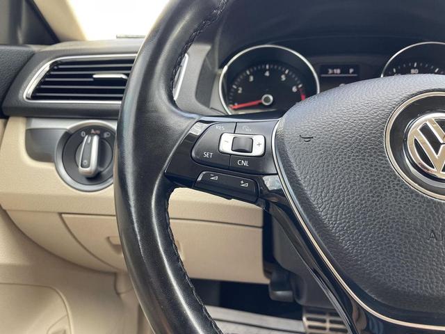 Photo of 2016 Fortana Red Volkswagen Passat