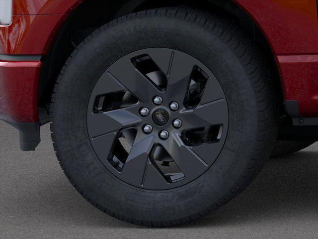 Photo of 2025 Rapid Red Metallic Tinted Clearcoat Ford F-150 Lightning