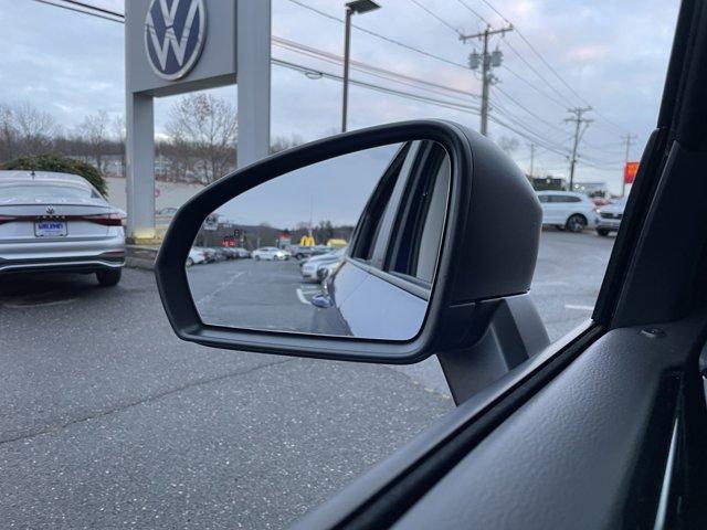 Photo of 2024 Dusk Blue Metallic Volkswagen Taos