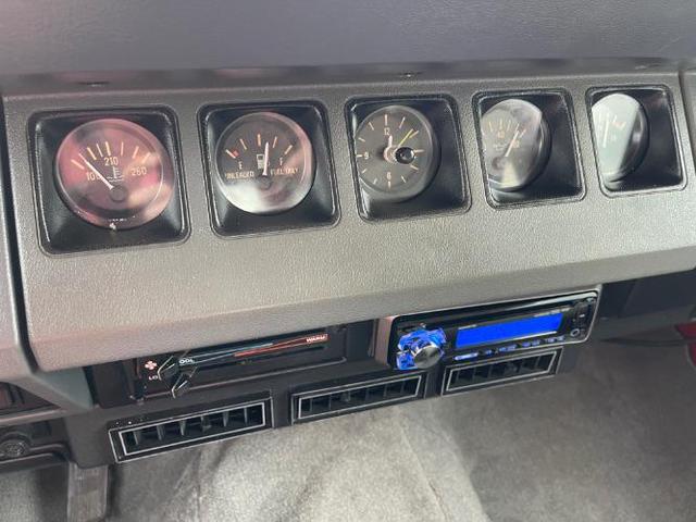 Photo of 1989 Red Jeep Wrangler