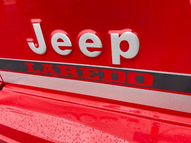 Photo of 1989 Red Jeep Wrangler