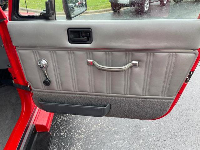 Photo of 1989 Red Jeep Wrangler