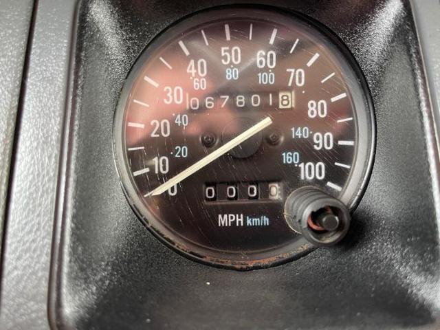 Photo of 1989 Red Jeep Wrangler