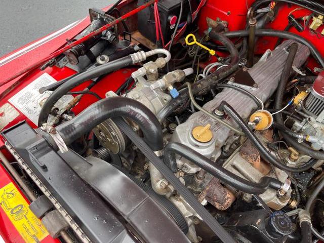 Photo of 1989 Red Jeep Wrangler