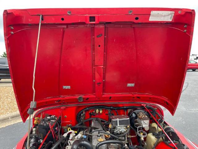 Photo of 1989 Red Jeep Wrangler