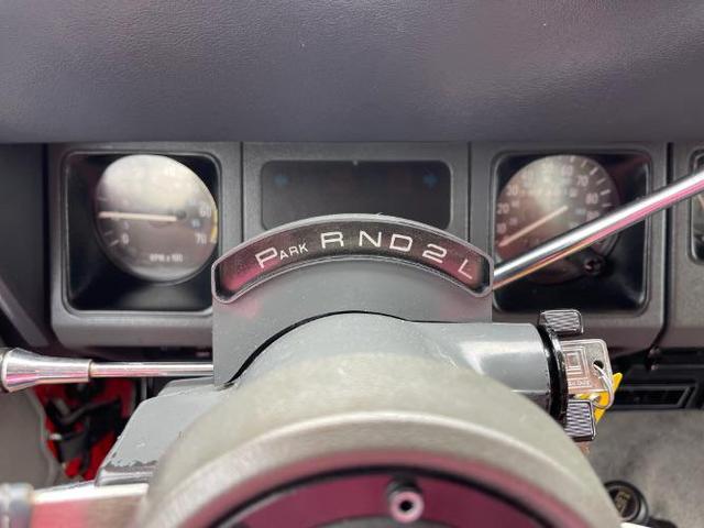 Photo of 1989 Red Jeep Wrangler