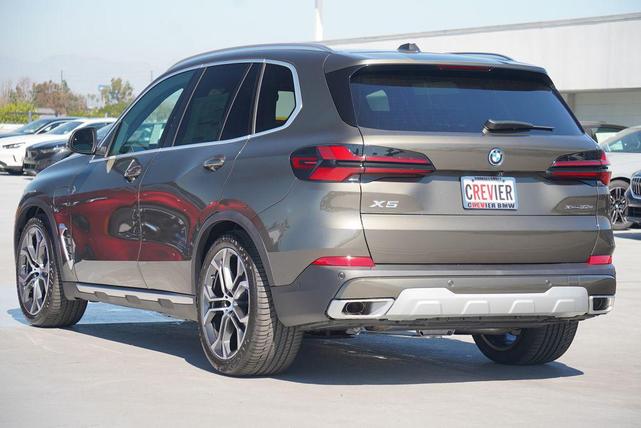 Photo of 2025 Manhattan Green Metallic BMW X5 PHEV