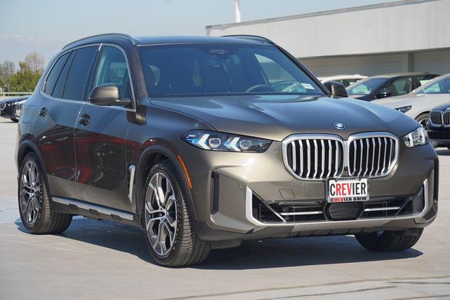 Photo of 2025 Manhattan Green Metallic BMW X5 PHEV