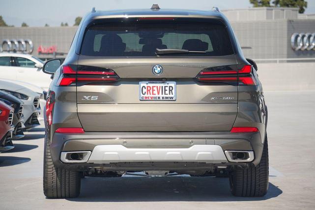 Photo of 2025 Manhattan Green Metallic BMW X5 PHEV