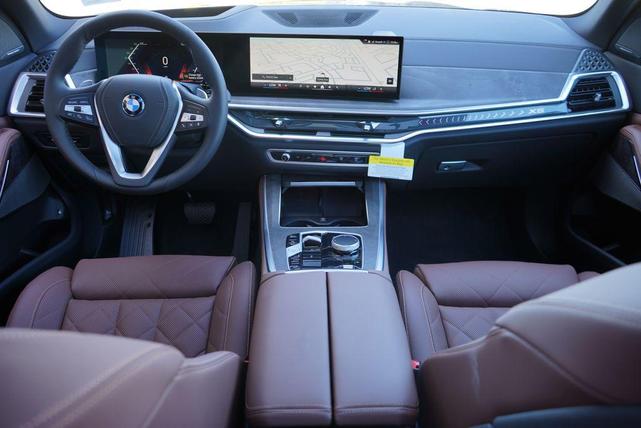 Photo of 2025 Manhattan Green Metallic BMW X5 PHEV
