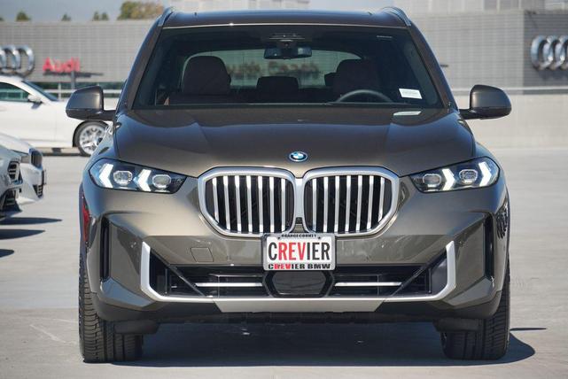 Photo of 2025 Manhattan Green Metallic BMW X5 PHEV
