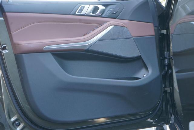 Photo of 2025 Manhattan Green Metallic BMW X5 PHEV
