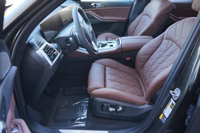 Photo of 2025 Manhattan Green Metallic BMW X5 PHEV