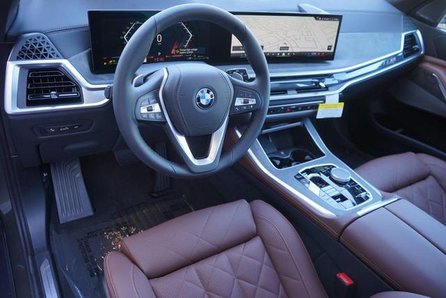 Photo of 2025 Manhattan Green Metallic BMW X5 PHEV