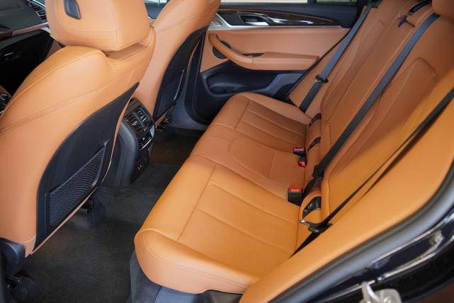 Photo of 2025 Black Sapphire Metallic BMW X4