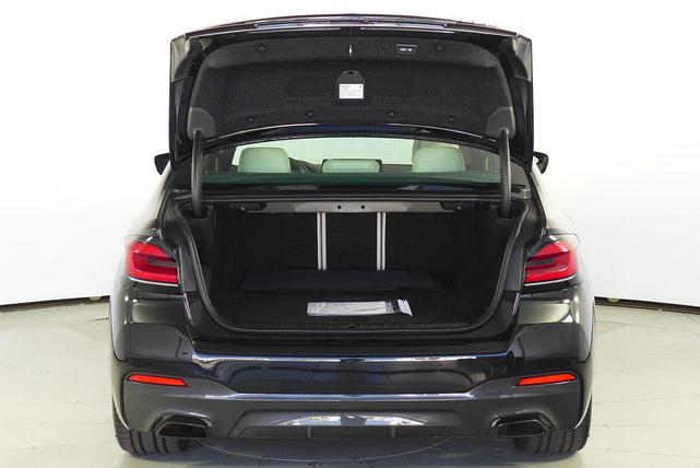 Photo of 2023 Black Sapphire Metallic BMW 530e