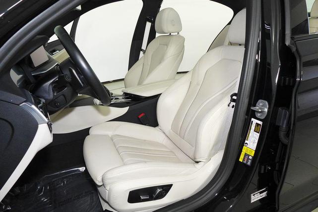 Photo of 2023 Black Sapphire Metallic BMW 530e
