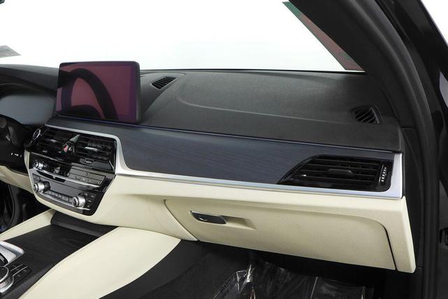 Photo of 2023 Black Sapphire Metallic BMW 530e