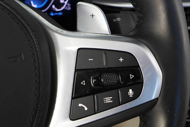 Photo of 2023 Black Sapphire Metallic BMW 530e