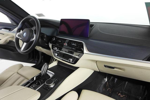 Photo of 2023 Black Sapphire Metallic BMW 530e