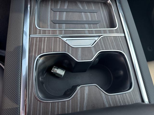 Photo of 2025 Dark Ember Tintcoat GMC Sierra EV