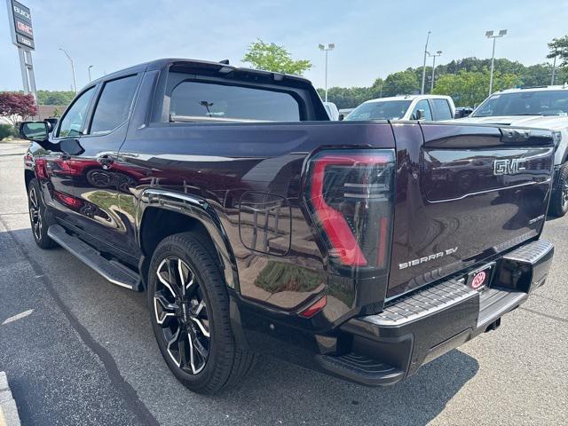 Photo of 2025 Dark Ember Tintcoat GMC Sierra EV