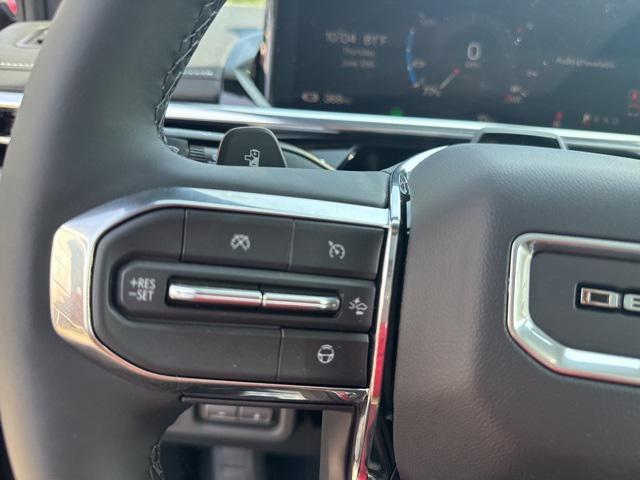 Photo of 2025 Dark Ember Tintcoat GMC Sierra EV