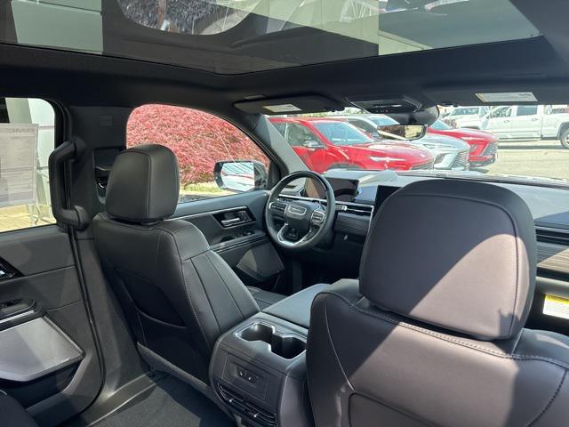 Photo of 2025 Dark Ember Tintcoat GMC Sierra EV