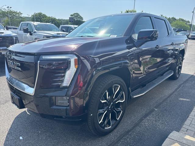 Photo of 2025 Dark Ember Tintcoat GMC Sierra EV