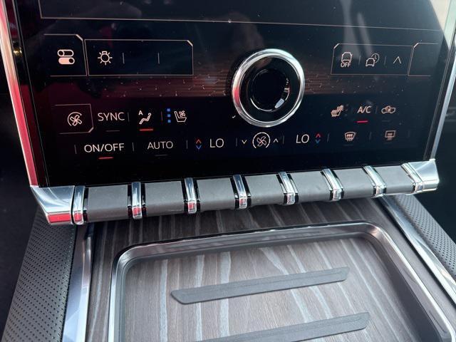 Photo of 2025 Dark Ember Tintcoat GMC Sierra EV