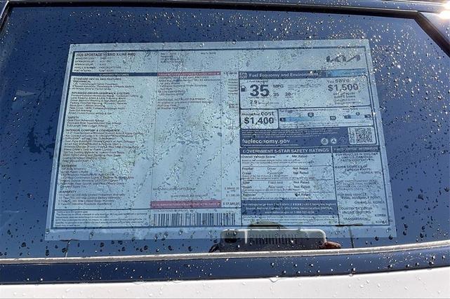 Photo of 2026 Wolf Gray Kia Sportage Hybrid