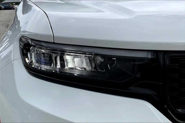 Photo of 2025 Bright White Clearcoat Jeep Grand Cherokee