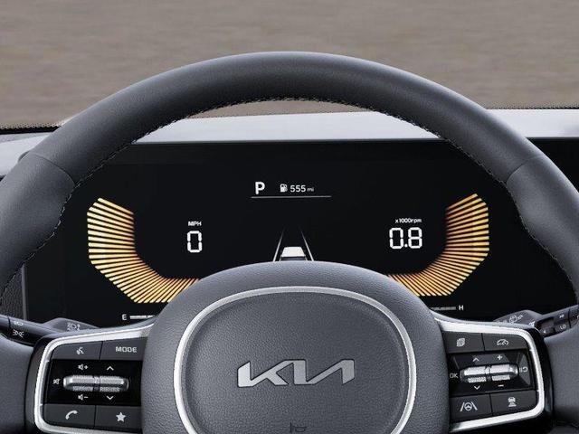 Photo of 2026 Deep Chroma Blue Kia Carnival Hybrid