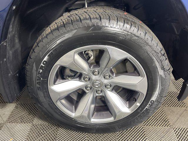 Photo of 2021 Patriot Blue Pearlcoat RAM 1500