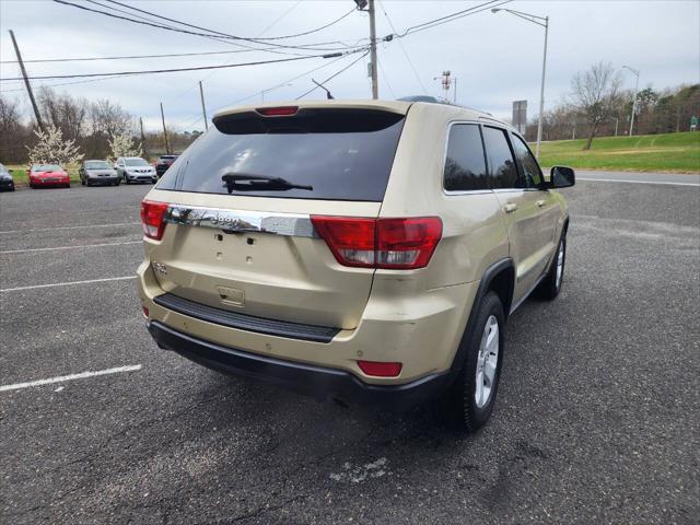 Photo of 2011 Champagne Jeep Grand Cherokee