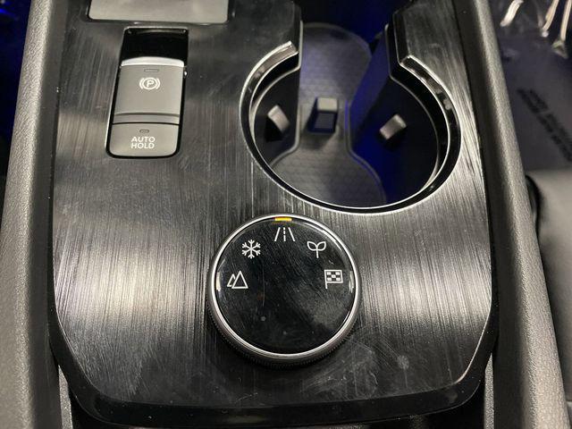 Photo of 2024 Champagne Silver Metallic/Super Black Nissan Rogue