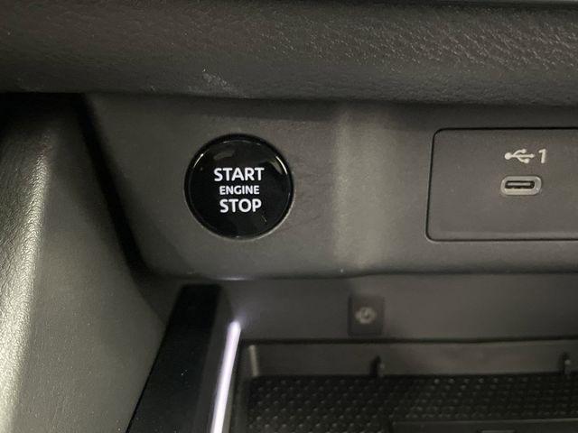 Photo of 2024 Champagne Silver Metallic/Super Black Nissan Rogue