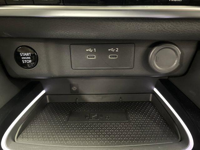 Photo of 2024 Champagne Silver Metallic/Super Black Nissan Rogue