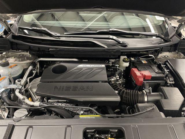 Photo of 2024 Champagne Silver Metallic/Super Black Nissan Rogue