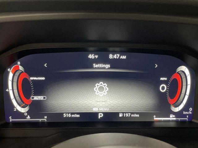Photo of 2024 Champagne Silver Metallic/Super Black Nissan Rogue