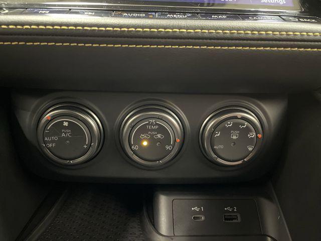 Photo of 2023 Ikazuchi Yellow Pearl Tricoat/Super Black Nissan Z