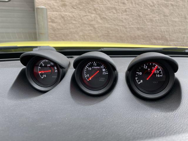 Photo of 2023 Ikazuchi Yellow Pearl Tricoat/Super Black Nissan Z