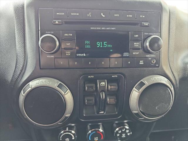 Photo of 2014 Bright White Clearcoat Jeep Wrangler Unlimited