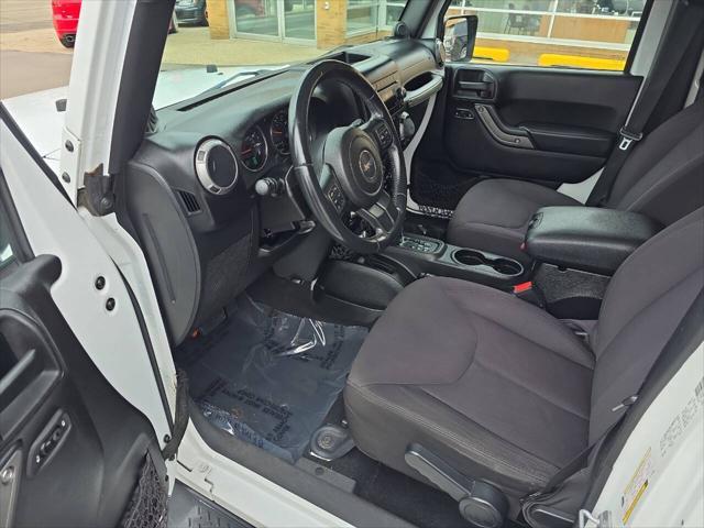 Photo of 2014 Bright White Clearcoat Jeep Wrangler Unlimited