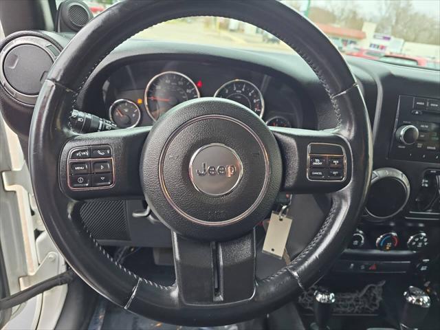 Photo of 2014 Bright White Clearcoat Jeep Wrangler Unlimited