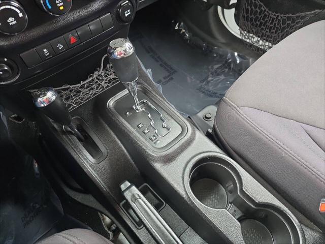 Photo of 2014 Bright White Clearcoat Jeep Wrangler Unlimited