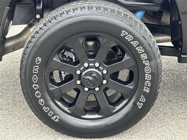Photo of 2024 Diamond Black Crystal Pearlcoat RAM 2500